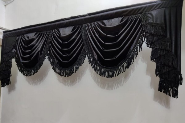 black swag valance hanged in room 