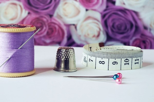 plum color reel with measuring tape