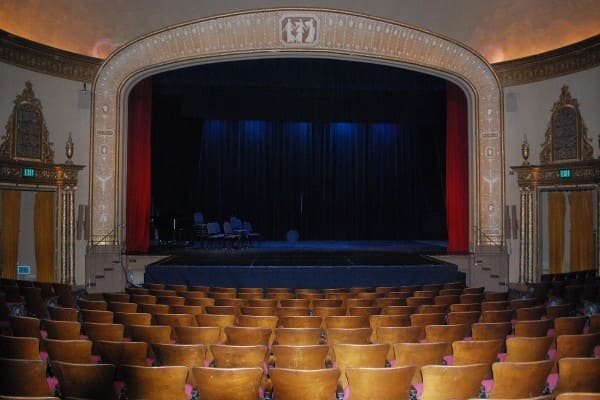 Blue curtain hanged in auditorium