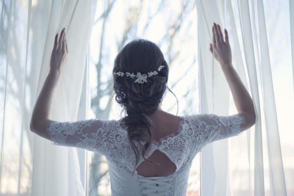 wide curtain slided by beautiful girl