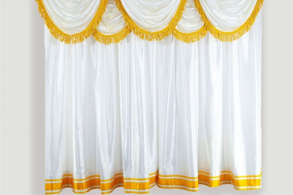 white valance curtains with laces at bottom