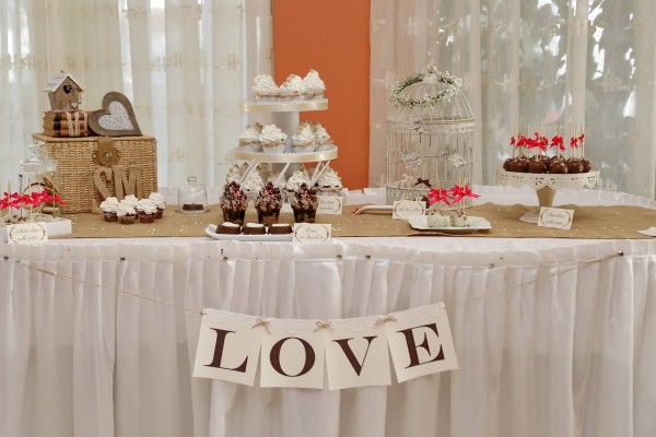 white box pleated table skirt decorated for party